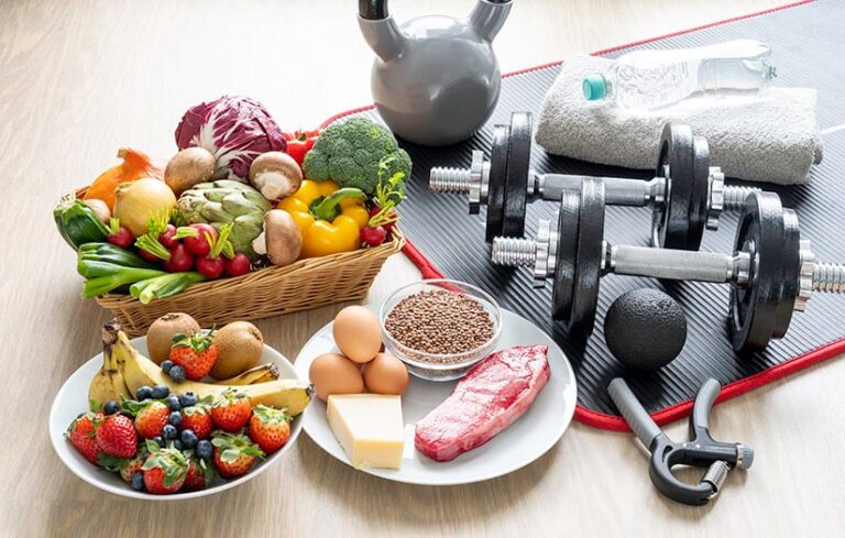fruit, veg and protein next to gym equipment